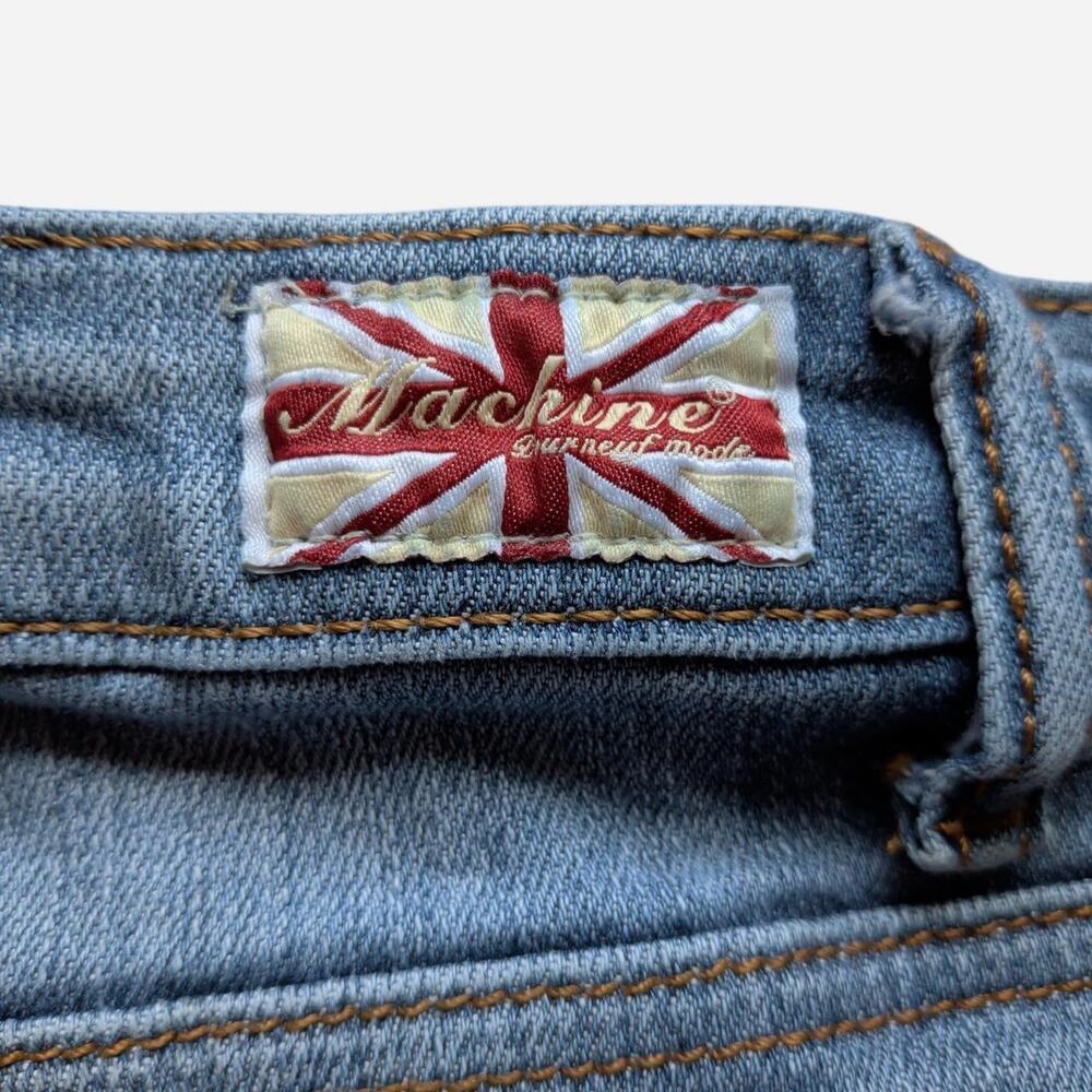 Machine blue denim distressed mini skirt